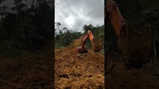 making roads to villages in Papua New Guinea #excavator