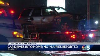 Car drives into home in Chazy