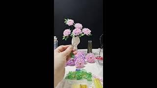 "小橘子吖直播：手工制作仿真牡丹花与精致紫粉色系串珠首饰教程"