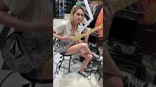 Playing the Volcom Skateboard Guitar in Store!