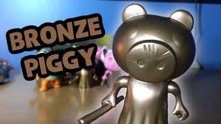 BRONZE PIGGY DISCOVERED (PIGGY TOYS)