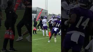 Quarterback Sam Howell connects with Thayer Thomas at practice 
