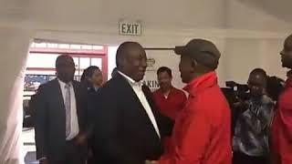 Julius Malema and Cyril share a hug