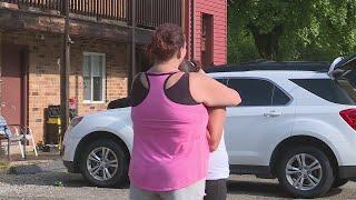 Flash flooding traps cars in a St. Charles apartment complex parking lot