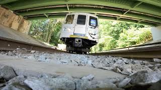 Slo Mo of Approaching R44 Train ; POV from Tracks, great undercarriage view