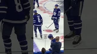 Nov. 8,2024- Red Wings vs #leafs - Mitch Marner chatting with equipment staff while getting hydrated