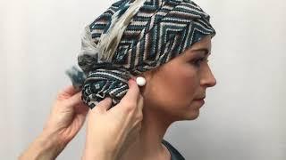 Teal chemo head scarf wrapped as turban with a hair elastic