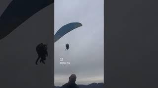 Two-person flight in high winds