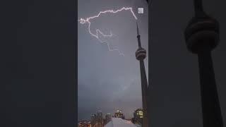Watch lightning strike the CN Tower during severe weather #toronto #lightning #cntower