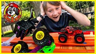 Monster Jam VS Hot Wheels Monster Trucks - ATTACK of the MINECRAFT ENDER DRAGON DOWNHILL RACE