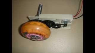 Motor-gear from CD-ROM driver and rollerskate wheel