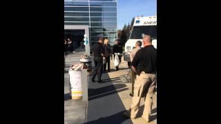 Sheriff's Office Robot giving donated food to Maxim Integrated.