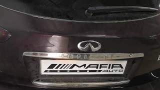 Infiniti EX35 замена лампочек подсветки номера. Снять обшивку (карту) задней (пятой) двери.