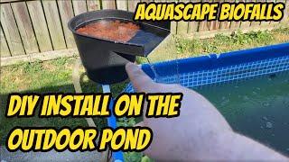 Installing an aquascape biofalls pond waterfall for summer tubbing, backyard fish pond