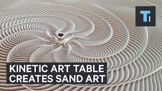 Table that creates sand art with marble that rolls by itself