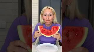 He was very surprised when he saw that she was eating a watermelon with pits