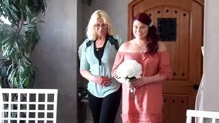 Dana Quehl walking down the isle to her husband Karl Quehl