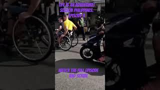 Life is an adventure!Philippines Angeles, Cebu Island, Manila. two  wheelchair man travel