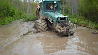 Homemade forwarder logging in wet forest, deep water