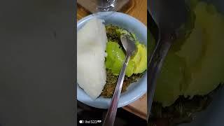 Eating ugali, sukuma wiki,and avocado, MercyNguku The World Traveller 