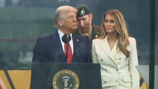 Trump told to GET OFF stage during failed parade speech