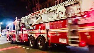 FDNY TOWER LADDER 35 RESPONDING ON AMSTERDAM AVENUE TO A FIRE ON WEST SIDE OF MANHATTAN, NEW YORK.