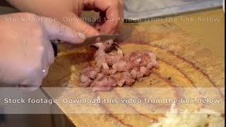 Cuts into small pieces of fish meat