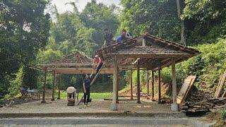 Day 5 at the resettlement site. Neighbors come to help Kong re-roof his house