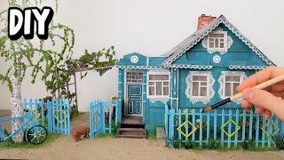 Village house with carved facade / Cardboard house DIY