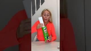 She showed him how to properly take out the Pringles chips so they wouldn't break