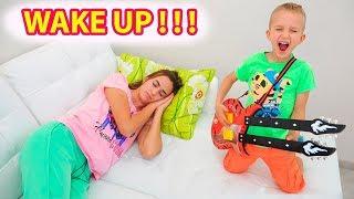 Vlad and Nikita pretend play music and wake up Mom