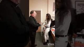 Traveller girl putting hand on bible