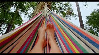 Girl with cute feet relaxing in a hammock!  Feet worship