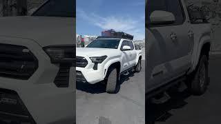 2024 Toyota Tacoma out of the shop with a Peak Suspension 2.25” lift kit. Can now fit 35s!