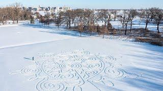 Artist creates a snow labyrinth in Madison