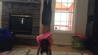 Charleigh Practicing  Handstands on Low Beam