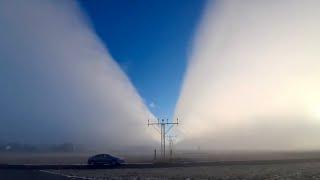 Giant Antonov Cuts Through Fog