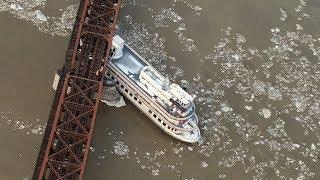 Ships slam into bridge after breaking free from Ice jams