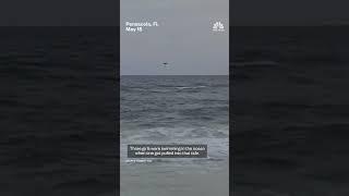 Video shows drone helping rescue girl caught in riptide
