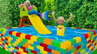 Katya and Dima How to Swim in the Kids Pool and Plays with Fun Water Toys