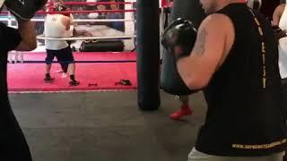 Coach Nelson Hitting the pads