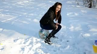 Beach ball pop in snow