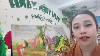 Kindergarten teacher tells a fairy tale about the turtle and the hare