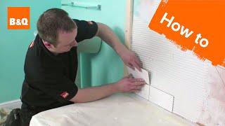 How to tile a bath splashback part 2: fixing the tiles