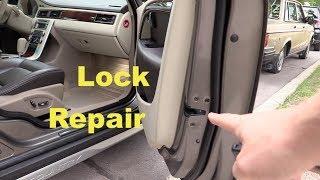 Door lock repair on Volvo XC70. Replacing  electrical motor.