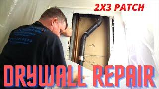 step-by-step process of patching a large hole in drywall after a plumber has repaired a drainpipe