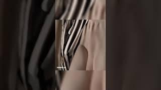 App: reemix.co text to video AI: A girl undressing her