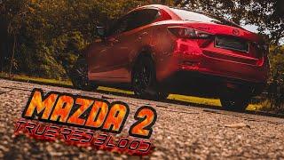 MAZDA 2 WRAPPED TO TRUE BLOOD RED