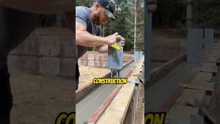 Securing wood columns with embedded connectors in fresh concrete #shorts