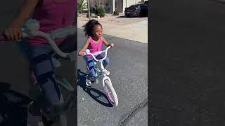 HER FIRST TIME RIDING A BIKE!